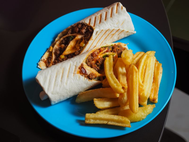 Guzman y Gomez Carnitas Burrito with slow-cooked pork