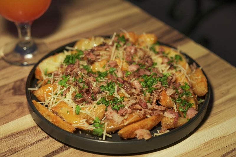 GYG Loaded Mexican Fries with cheese and salsa
